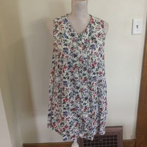 Button-up sleeveless floral blouse